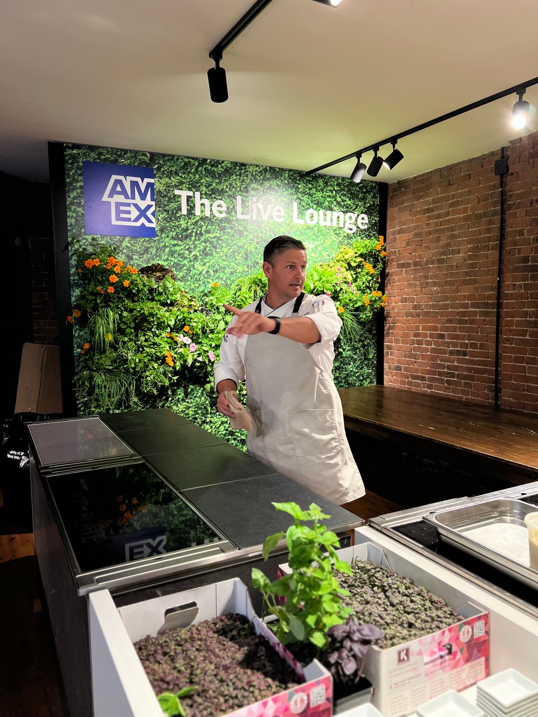 Chef preparing at the living wall counter